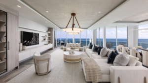 Biophilic curves in a Miami luxury interior — arched doorway, curved cabinetry and flowing ceiling detail by Sarah Z Designs.