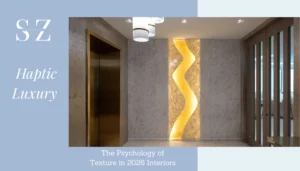 Haptic luxury interiors 2026 featuring textured stone walls and sculptural amber light installation — haptic design concept by Sarah Z Designs Miami