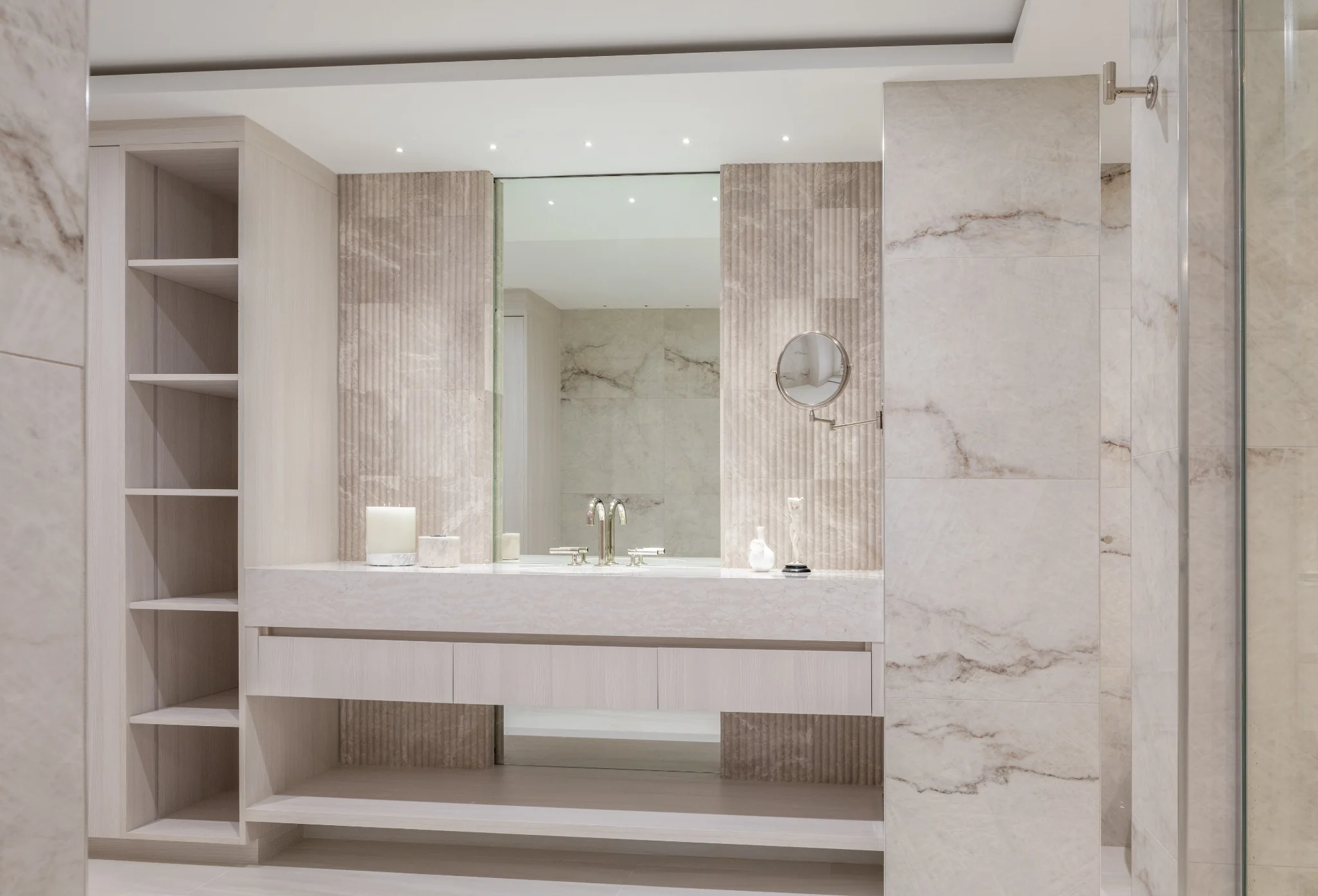 Spa-like Miami penthouse bathroom designed by Sarah Z Designs with pale wood, honed natural stone and tactile surfaces that bring a quiet, restorative quality to high-rise living.